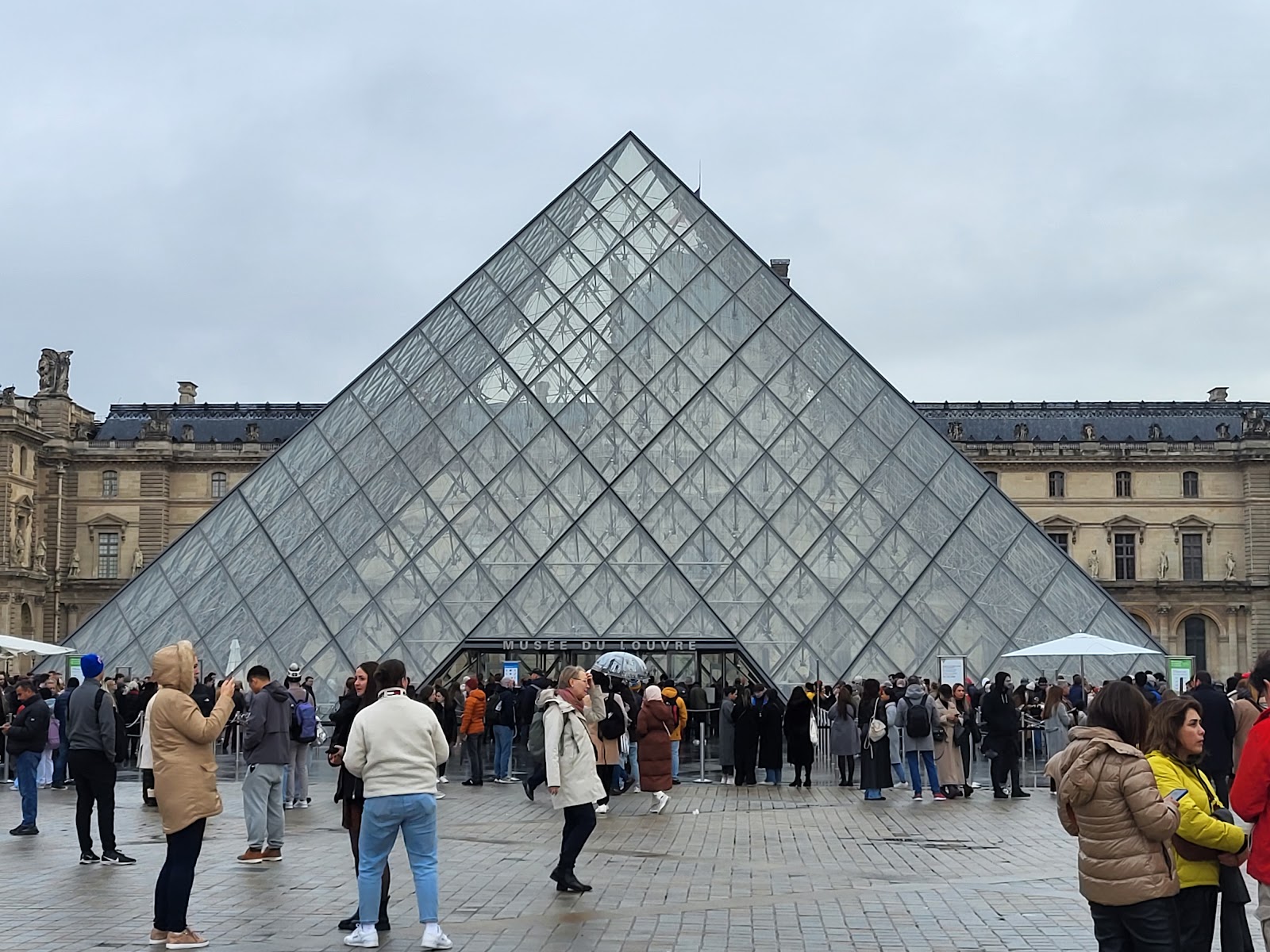 The pyramid entrance to the Louvre museum.